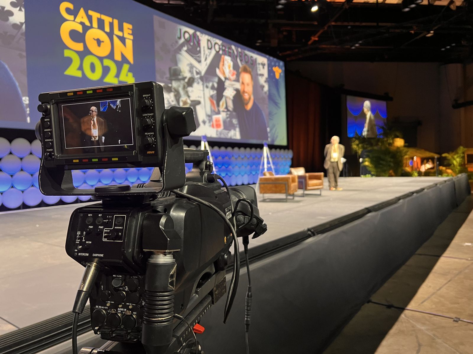 Broadcast camera filming a keynote stage